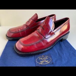 Men’s Prada red leather penny loafers